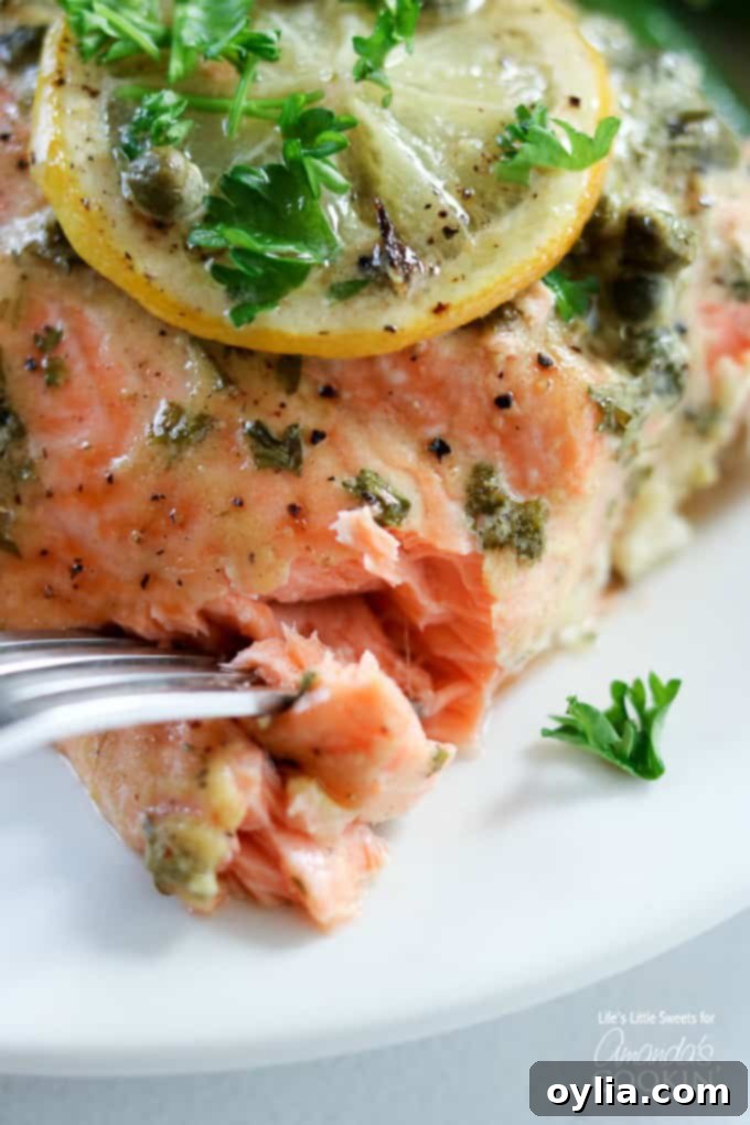 Flaky and satisfying dijon lemon caper salmon recipe.
