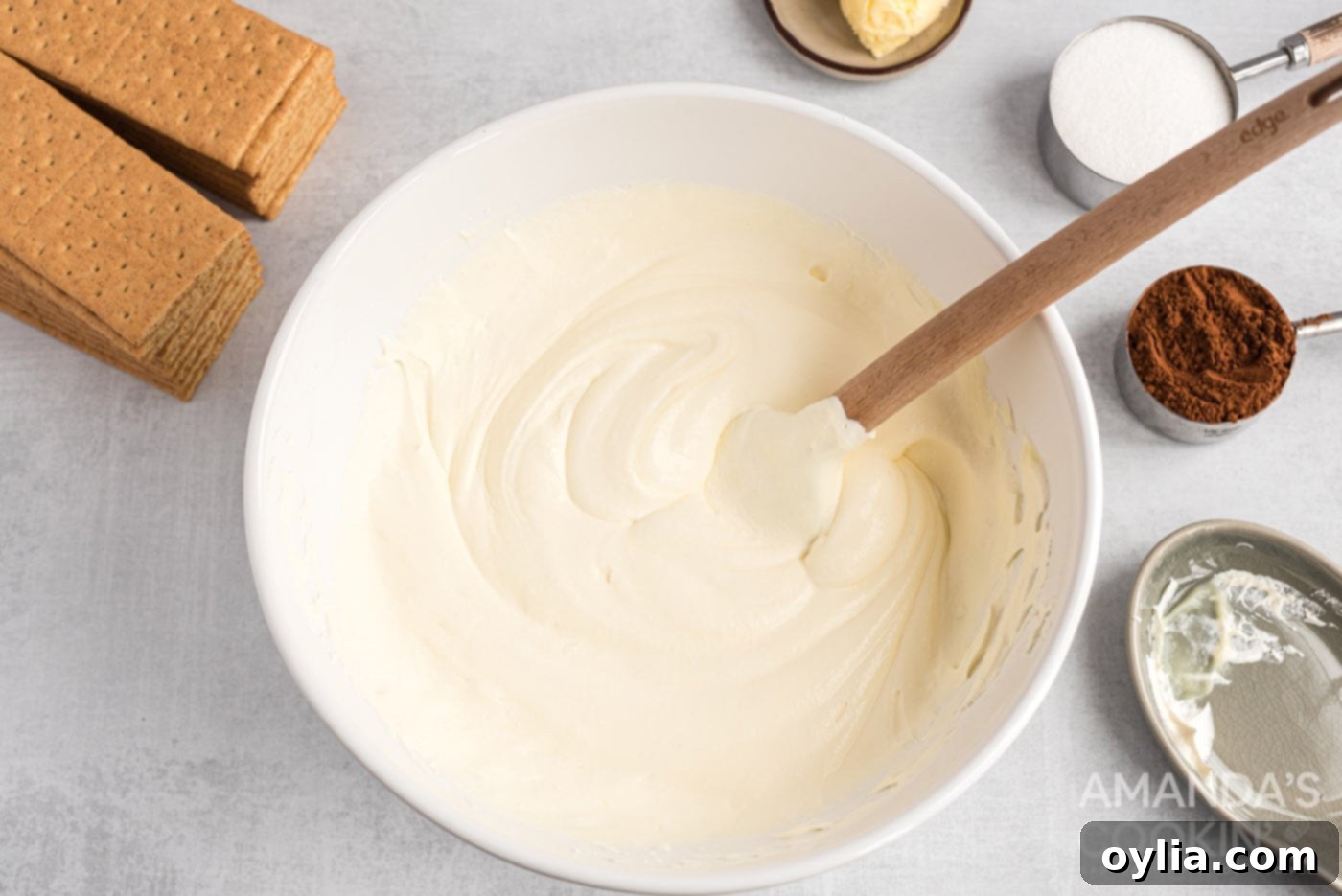 The perfectly combined pudding and whipped topping mixture, now smooth and ready to be layered into the eclair cake.