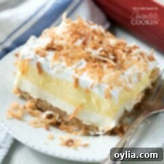 Coconut Velvet Bliss 2 coconut cream pie layered dessert on a plate