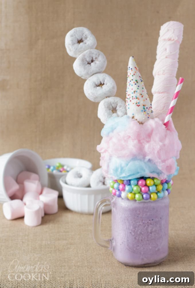 purple milkshake with donuts and marshmallows