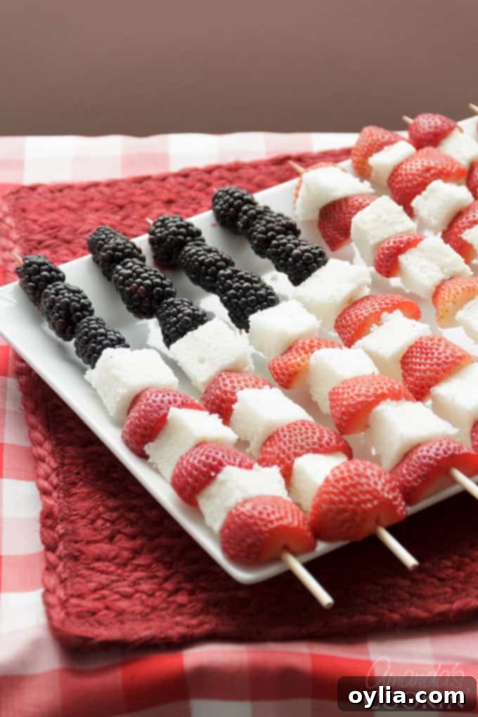 American Flag kabobs made from fruit and angel food cake