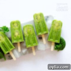 Green smoothie popsicles on a bed of ice
