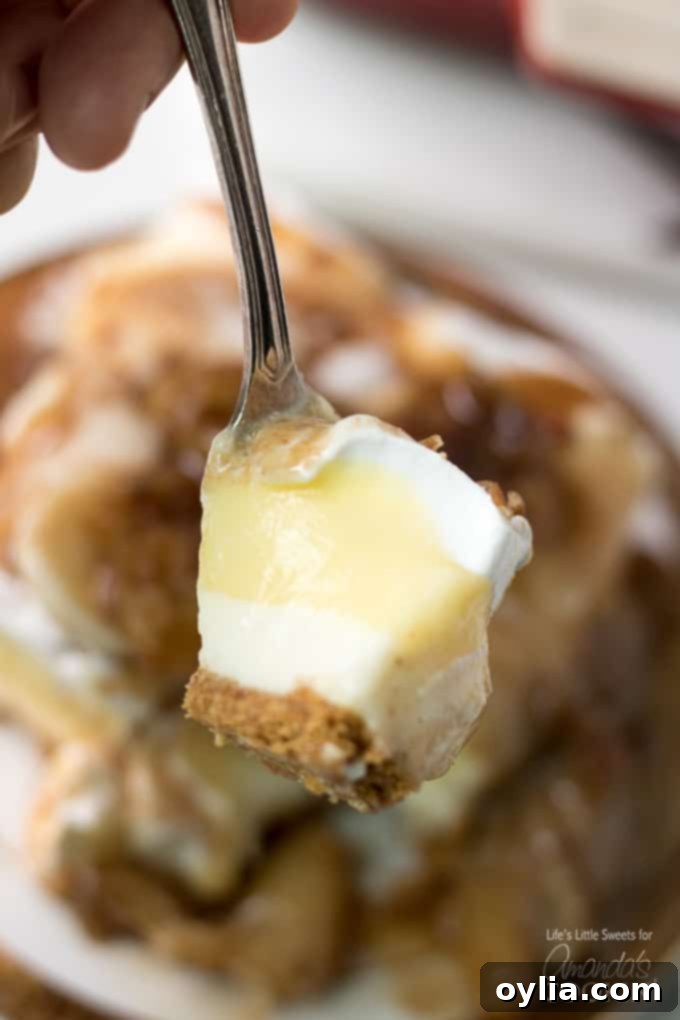 fork full of banana cream lush layered dessert