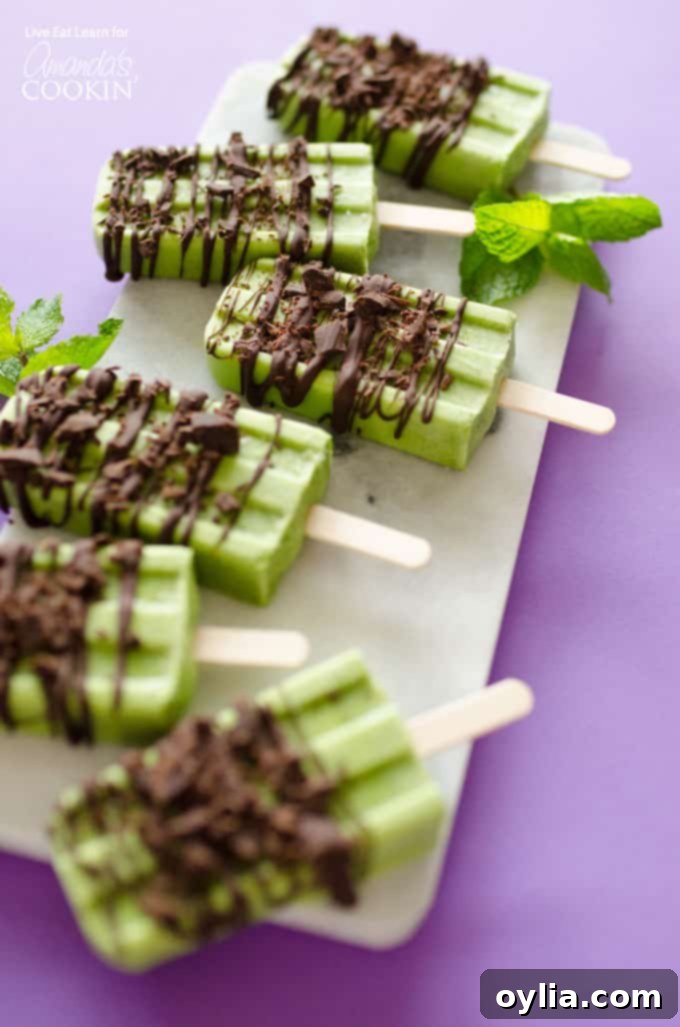 Mint Chocolate Popsicles with Coconut, drizzled with chocolate