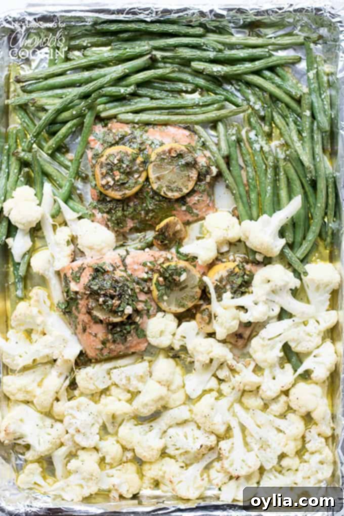 Salmon sheet pan dinner with green beans and cauliflower from above