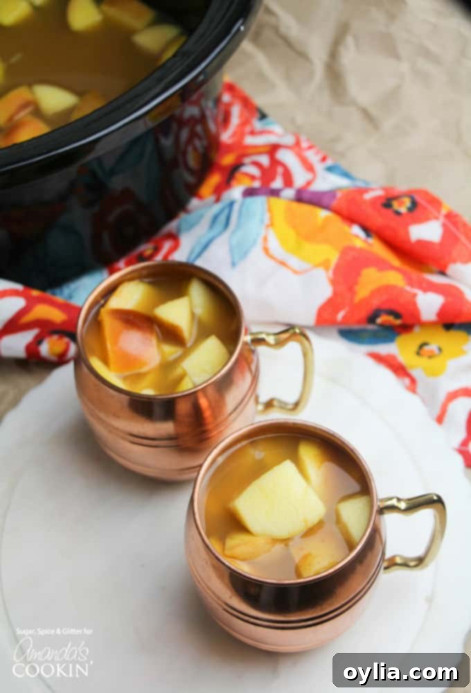 Crockpot Caramel Apple Cider in mugs