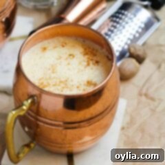 Classic copper mug of homemade eggnog, perfectly spiced and ready to enjoy.