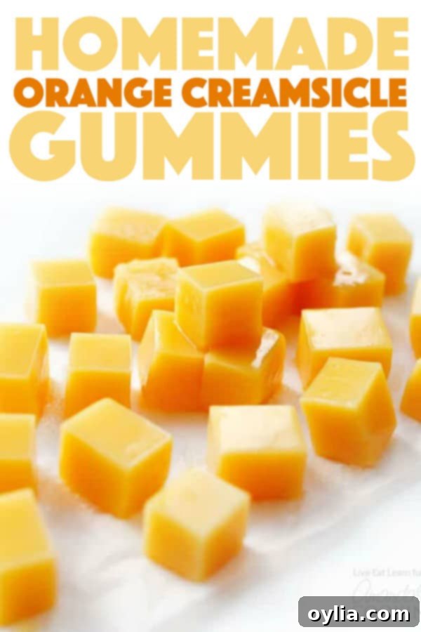 Easy homemade orange creamsicle gummies arranged artfully, highlighting their appeal as a healthy snack.