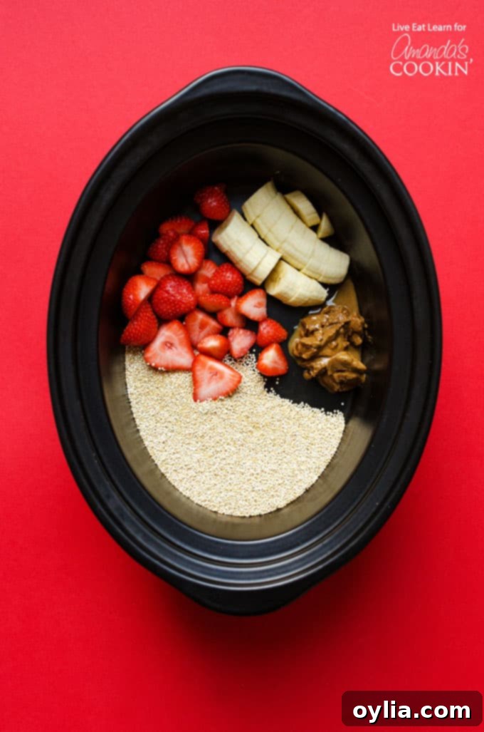 Ingredients for slow cooker breakfast quinoa arranged in a crockpot, ready to cook