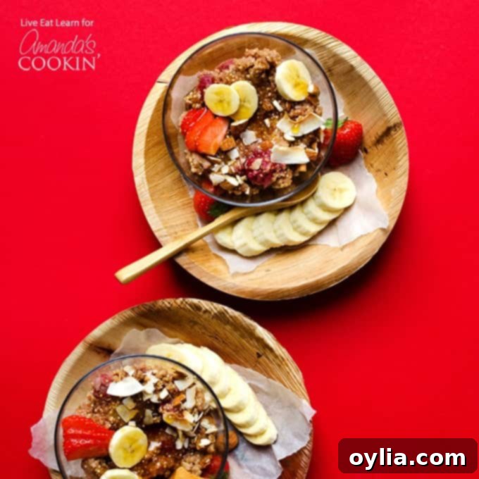 Bowl of cooked breakfast quinoa topped with fresh banana slices