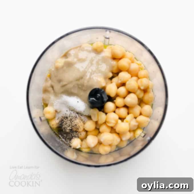 Ingredients for hummus in food processor