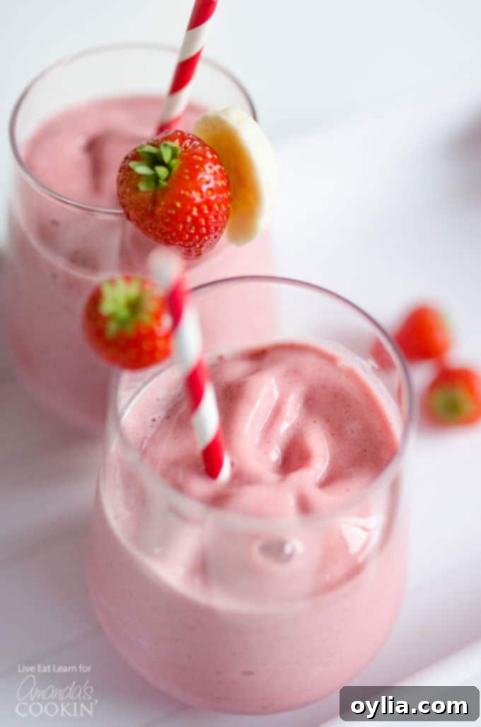 strawberry banana smoothie with straws
