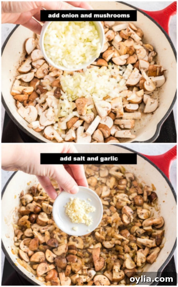 This classic beef stroganoff recipe from scratch features tender slices of steak and savory mushrooms smothered in creamy brown gravy that's ready in 30! #beefrecipes #beefstroganoff #pasta #pastarecipes #dinnerrecipes #mushrooms #skillet #skilletdinners #easydinnerrecipes #noodles Adding chopped onion, sliced mushrooms, and minced garlic to a skillet to sauté, building the flavor base for the stroganoff.