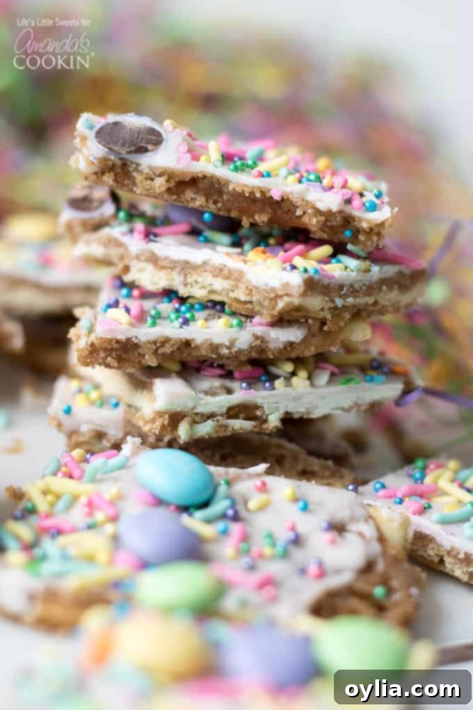 Festive Easter Toffee on a tray, made with saltine crackers, white chocolate, and pastel Easter sprinkles. Perfect for spring desserts.