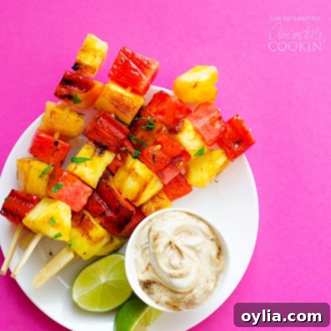 Watermelon and Pineapple skewers on a cutting board, ready to be grilled