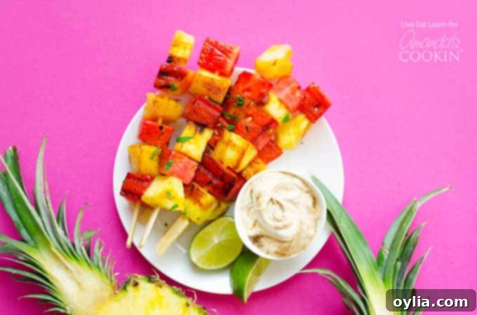 Grilled Watermelon and Pineapple skewers served with a side of yogurt dipping sauce