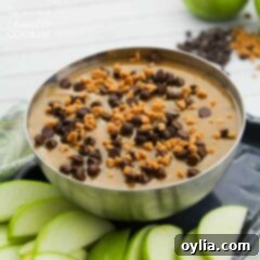 Caramel apple dip in silver bowl
