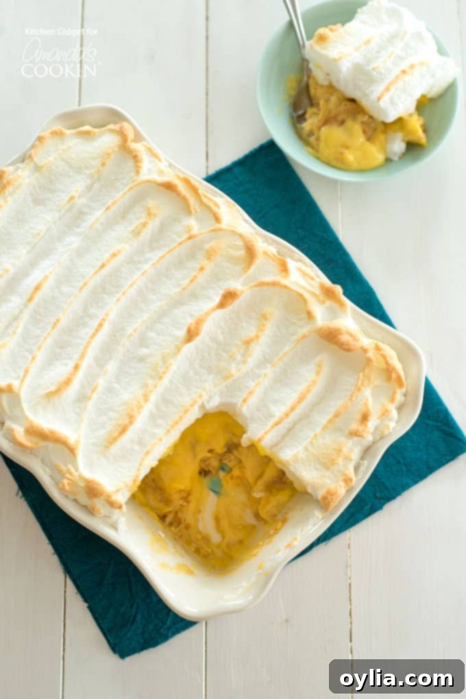 Delicious homemade banana pudding with a fluffy meringue topping, ready to be served
