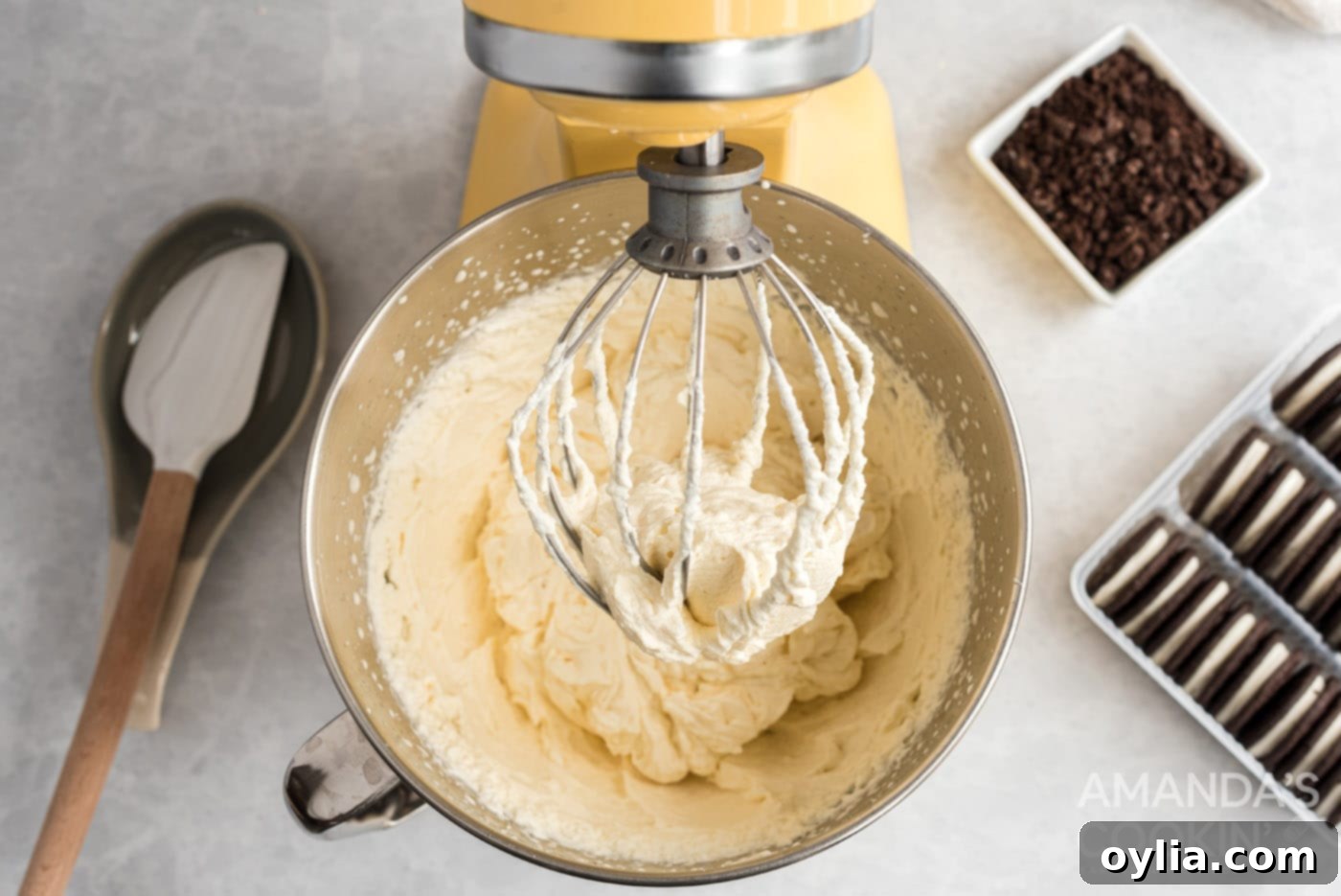 cream, powdered sugar, and vanilla in a stand mixer bowl