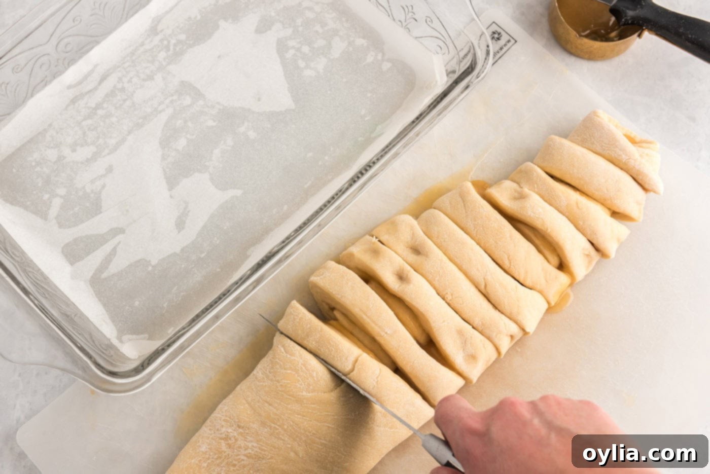 cutting dough logs into sections