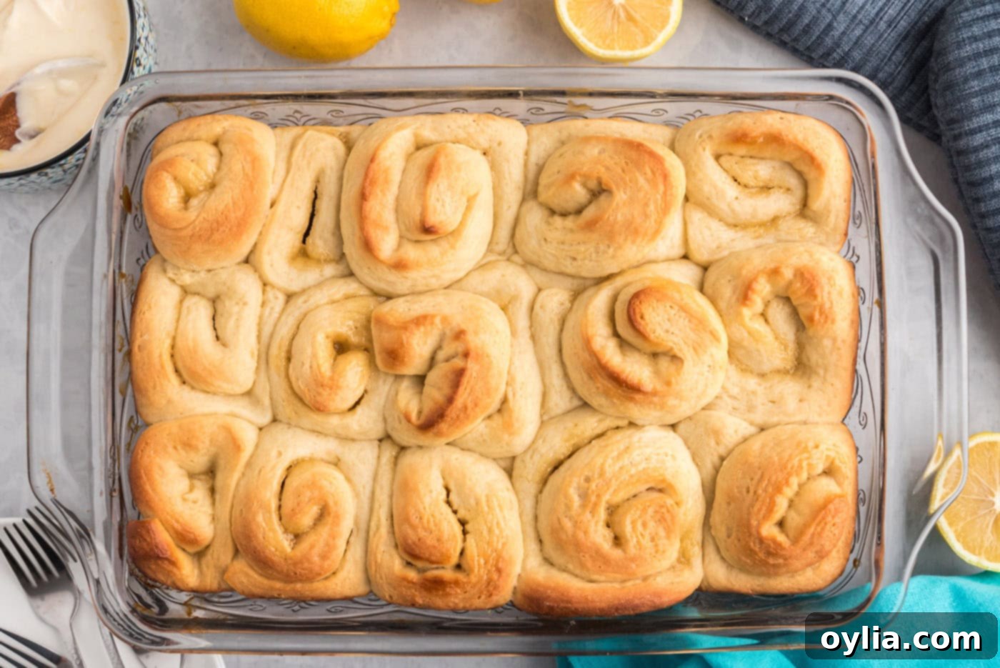baked lemon sweet rolls in a casserole dish