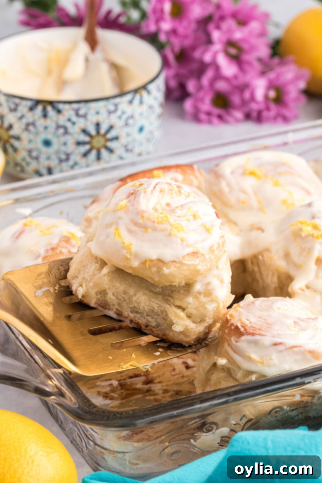 Sunshine Lemon Sweet Rolls 3 Lemon Sweet Roll being lifted from the pan