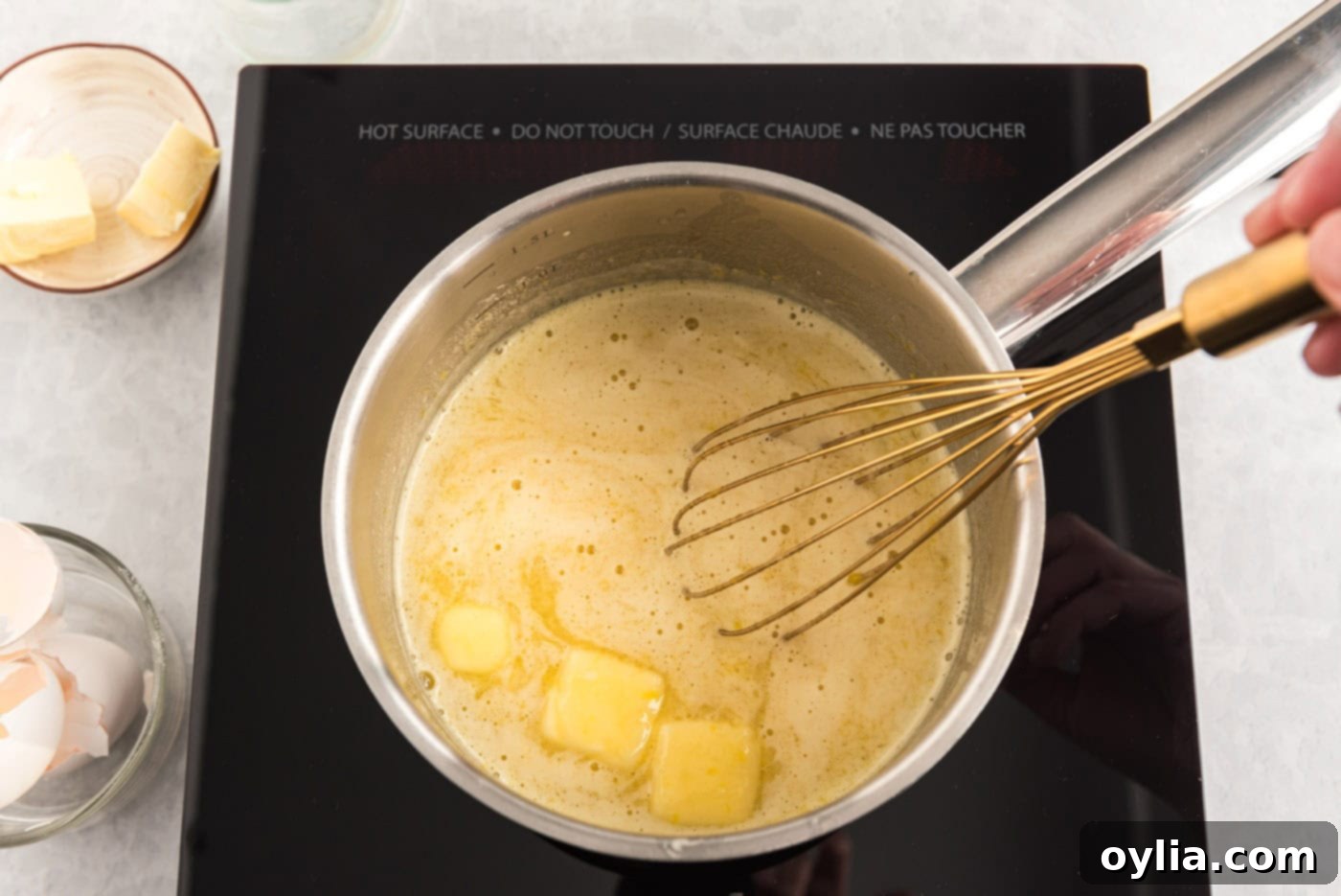 whisking butter into egg and buttermilk mixture