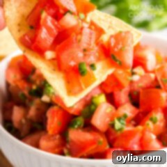 tortilla chip topped with salsa fresca