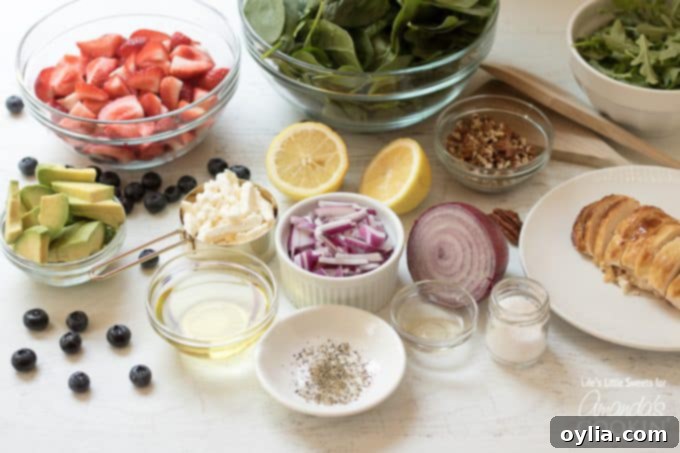 Ingredients for strawberry salad in bowls