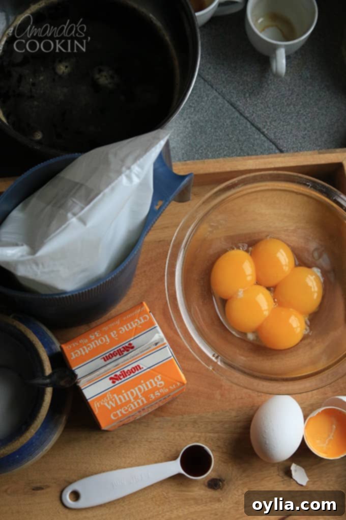 Separating egg yolks from egg whites for the Espresso Creme Brulee recipe.