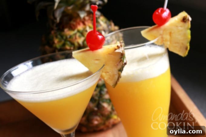 rum cruiser cocktails, frozen style with pineapple garnish
