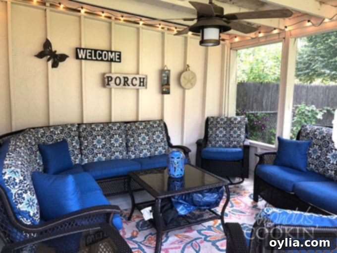 A cozy and inviting screened porch area, perfect for relaxing and entertaining.