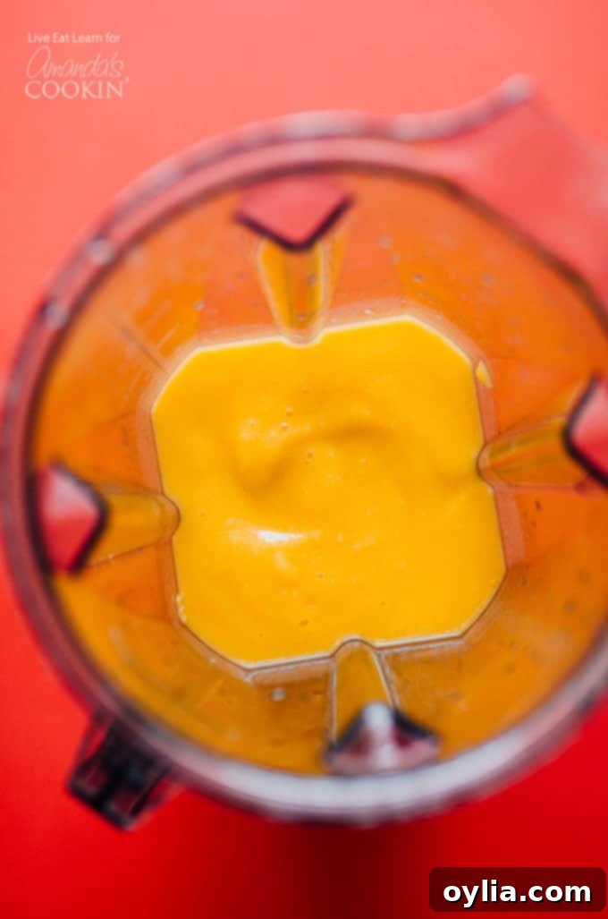 Mango margarita slush in a blender