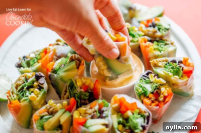 Mexican style summer rolls dipped into smoky chipotle sauce