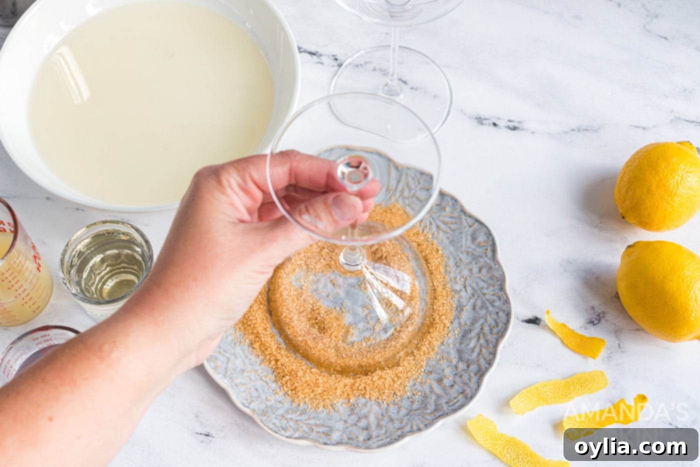 dipping cocktail glass in sanding sugar
