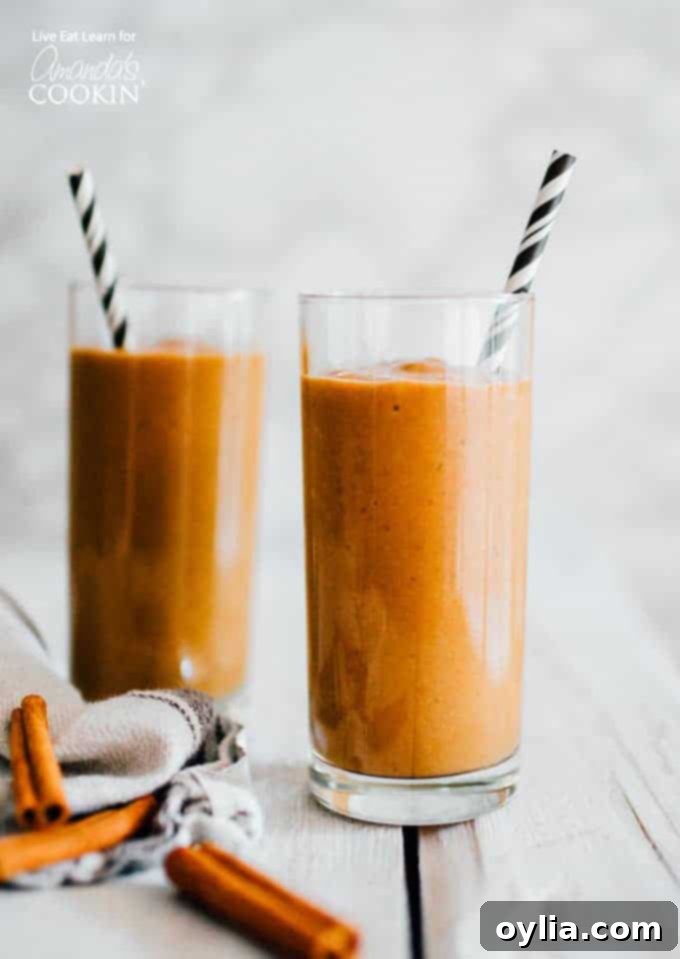 Pumpkin Spice Latte Smoothie with striped paper straws