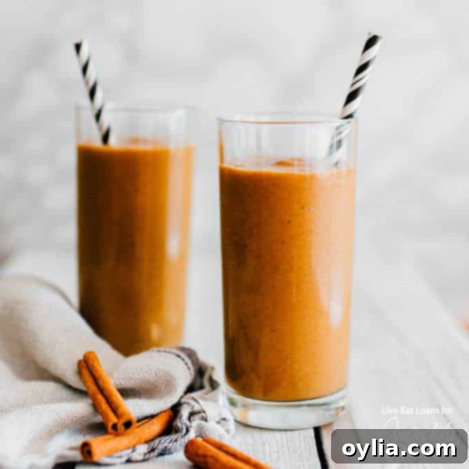 smoothie in a glass with a straw