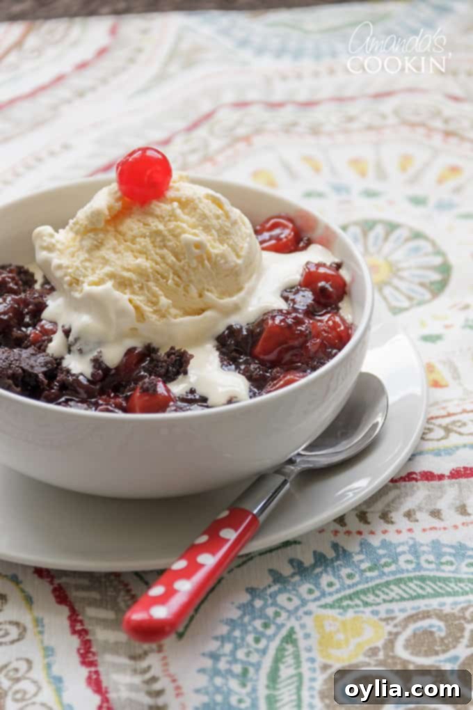 Delicious crockpot chocolate cherry cobbler ready to be served