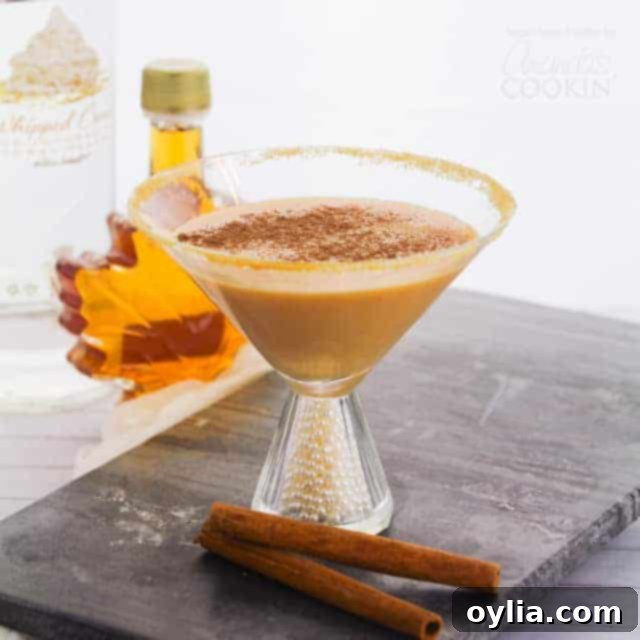 Close-up of a festive pumpkin martini, beautifully garnished and ready to be enjoyed.