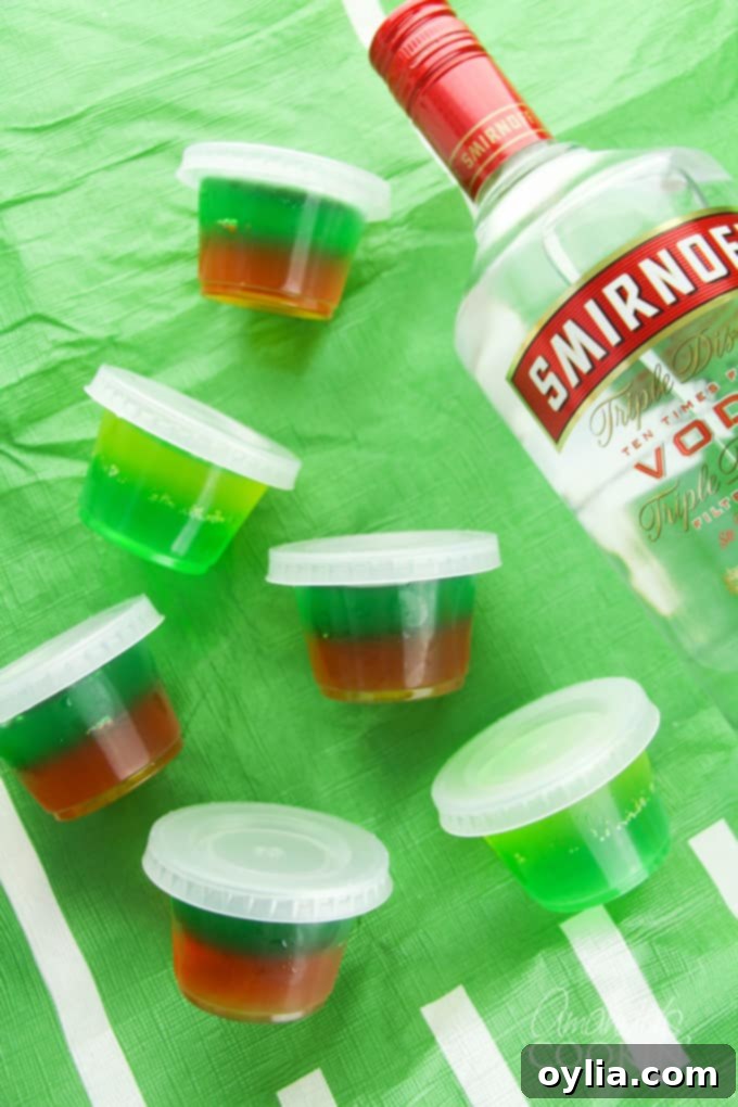 Vibrant football jello shots in team colors ready for tailgating