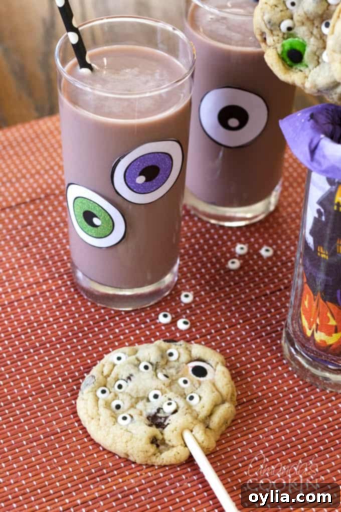 Monster Eyeball Cookie Pops paired with spooky chocolate milk for Halloween fun