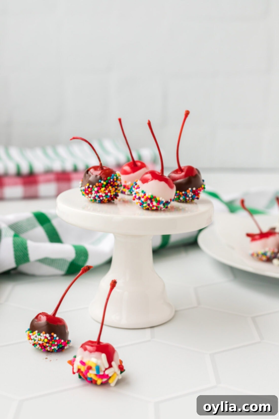 Spirited Crimson 2 Spiked Cherries on a cupcake stand