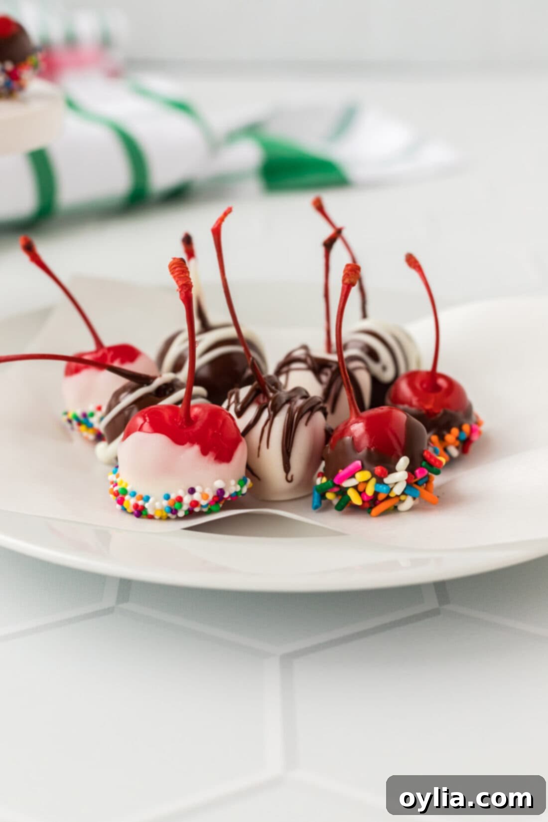 Spirited Crimson 3 chocolate dipped Spiked Cherries on a plate