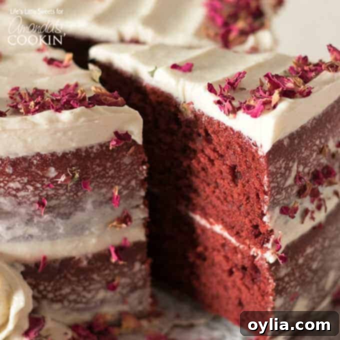 slice of red velvet cake being removed with pie server