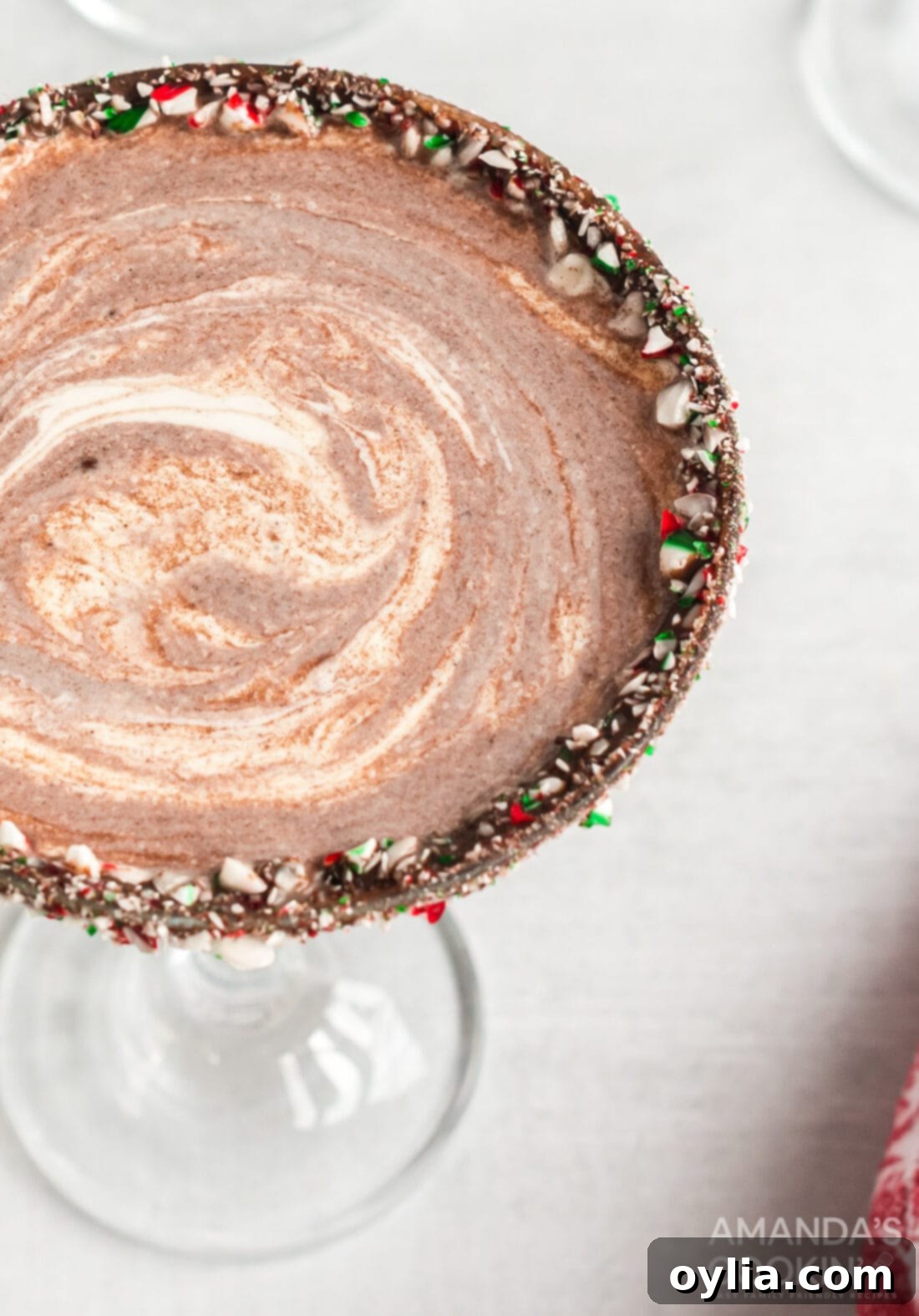 Overhead view of a perfectly mixed chocolate peppermint martini, ready to be enjoyed.