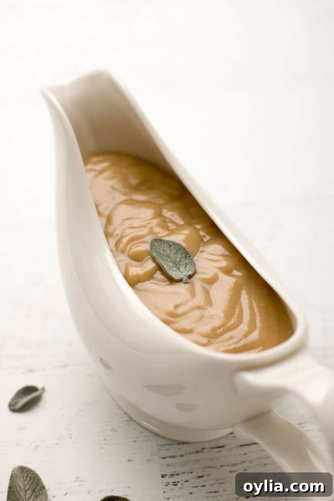 The Ultimate Homemade Turkey Gravy 2 Gravy boat of Homemade Turkey Gravy ready to be served