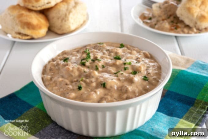 A bowl of creamy, peppery homemade sausage gravy ready to be enjoyed