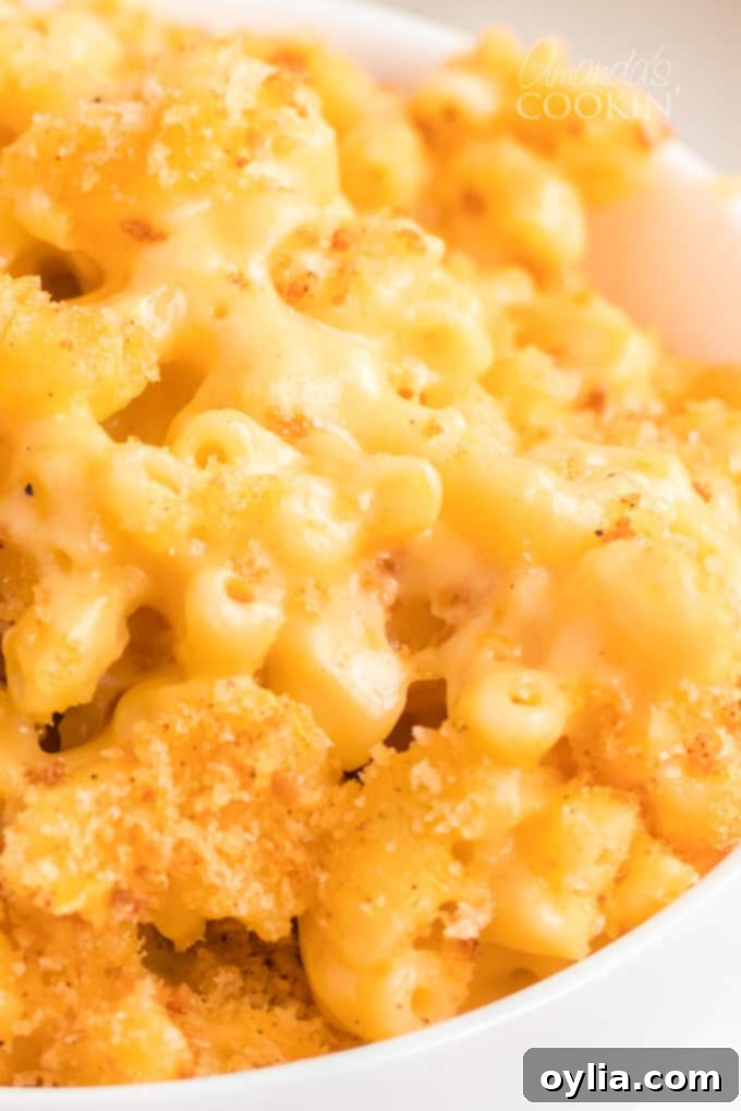 Close-up of creamy, bubbly baked macaroni and cheese straight from the oven