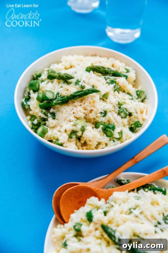 Cauliflower risotto garnished with fresh asparagus