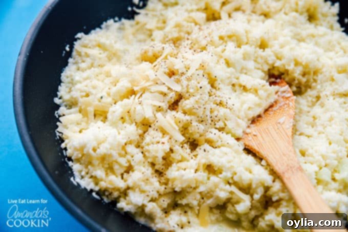 Close-up of creamy cauliflower risotto simmering in a saute pan